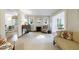 Cozy living room with fireplace, neutral decor, and seamless flow to adjacent rooms at 202 Lakeview Ave, Atlanta, GA 30305
