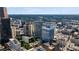 Amazing aerial view of city skyline with tall office buildings and greenery at 32 Peachtree Nw St # 1303, Atlanta, GA 30303