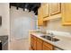 Well-lit kitchen featuring stainless steel sink and appliances, with neutral countertops at 32 Peachtree Nw St # 1303, Atlanta, GA 30303