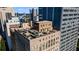 Aerial view of rooftop patios in downtown area, near modern high-rise buildings at 32 Peachtree Nw St # 1303, Atlanta, GA 30303