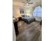 Bedroom with modern wood flooring, ceiling fan, and a large window at 400 17Th Nw St # 2031, Atlanta, GA 30363