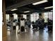 Bright gym features an array of modern cardio machines and large windows overlooking the exterior at 400 17Th Nw St # 2031, Atlanta, GA 30363