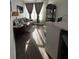 Well-lit living room featuring comfortable seating and seamless flooring leading to other living areas at 400 17Th Nw St # 2031, Atlanta, GA 30363