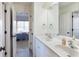 Well-lit bathroom showcasing a double vanity and ample cabinet space at 4514 Heathrow Nw Ct, Kennesaw, GA 30152