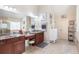 Bathroom featuring double sink vanity, and an elegant glass door shower at 4514 Heathrow Nw Ct, Kennesaw, GA 30152