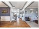 Open-concept interior showcasing hardwood floors, neutral walls, and large windows for natural light at 4514 Heathrow Nw Ct, Kennesaw, GA 30152