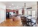 Well-appointed kitchen with stainless steel appliances, granite countertops, and a wooden island and breakfast nook at 4514 Heathrow Nw Ct, Kennesaw, GA 30152