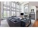 Bright and airy living room with soaring ceilings, large windows, and an open layout showcasing stylish decor at 4514 Heathrow Nw Ct, Kennesaw, GA 30152