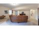 Spacious living area featuring a comfortable sectional and stylish decor at 4514 Heathrow Nw Ct, Kennesaw, GA 30152