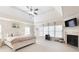Bright main bedroom featuring a fireplace, vaulted ceiling and large windows offering plenty of natural light at 4514 Heathrow Nw Ct, Kennesaw, GA 30152