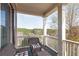 Relaxing porch view overlooking lush greenery and a serene landscape, perfect for enjoying the outdoors at 4514 Heathrow Nw Ct, Kennesaw, GA 30152