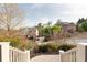 Scenic view from the porch featuring the neighboring homes and vibrant greenery at 4514 Heathrow Nw Ct, Kennesaw, GA 30152