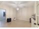 Bright, blank room with versatile use. The room is lit with a chandelier at 4514 Heathrow Nw Ct, Kennesaw, GA 30152