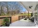 A covered back porch with outdoor seating and a view of the backyard at 490 Third Ave, Scottdale, GA 30079