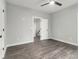 Neutral bedroom with fan and wood floors, offering a serene space with ample natural light at 490 Third Ave, Scottdale, GA 30079