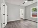 Cozy bedroom features wood floors and abundant natural light, creating a welcoming and peaceful retreat at 490 Third Ave, Scottdale, GA 30079