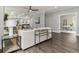 Inviting living area with stylish furnishings and an open view of the kitchen and dining space at 490 Third Ave, Scottdale, GA 30079