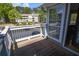 Cozy balcony with wooden floor and scenic views at 1005 Berkeley Woods Dr, Duluth, GA 30096