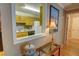 Kitchen view from entryway showcasing wood cabinets and modern appliances at 1005 Berkeley Woods Dr, Duluth, GA 30096