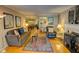 Inviting living room with hardwood floors, fireplace and comfortable seating at 1005 Berkeley Woods Dr, Duluth, GA 30096