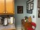 Practical kitchen space with wooden cabinets and essential countertop appliances for efficient food preparation at 1109 Granite Ln, Loganville, GA 30052