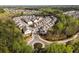 Aerial view of a residential community, highlighting its layout and green spaces at 1157 Hannaford Ln, Johns Creek, GA 30097