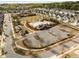 Aerial view of the community amenities, including a pool, playground, and open green space at 1157 Hannaford Ln, Johns Creek, GA 30097