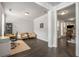 Inviting living room with hardwood floors, neutral walls, and ample natural light, creating a cozy space at 1157 Hannaford Ln, Johns Creek, GA 30097