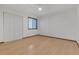 Bedroom boasting hardwood floors, a window with blinds, a ceiling fan and a double door closet at 2243 Provence Ne Ct, Marietta, GA 30066