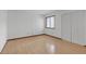 Bedroom boasting hardwood floors, a window with blinds, and a double door closet at 2243 Provence Ne Ct, Marietta, GA 30066