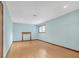 Bedroom featuring hardwood floors, a window with blinds, light blue walls, and recessed lighting at 2243 Provence Ne Ct, Marietta, GA 30066