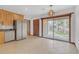 Bright kitchen with stainless steel appliances and a sliding glass door to the patio at 2243 Provence Ne Ct, Marietta, GA 30066