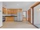 Well-equipped kitchen with stainless steel appliances, wooden cabinets, and tile flooring at 2243 Provence Ne Ct, Marietta, GA 30066