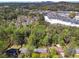 Scenic aerial view capturing the neighborhood with mature trees and convenient proximity to local shopping centers and amenities at 681 Counsel Dr, Marietta, GA 30068