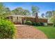This brick home boasts a patio and covered porch, seamlessly blending indoor and outdoor living spaces at 681 Counsel Dr, Marietta, GA 30068