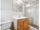 This is a bathroom with a shower, toilet, and sink with vanity at 681 Counsel Dr, Marietta, GA 30068