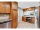 Bright kitchen showcasing granite countertops, tiled backsplash, and stainless appliances at 681 Counsel Dr, Marietta, GA 30068