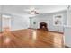 Spacious living room boasts hardwood floors and a cozy brick fireplace at 681 Counsel Dr, Marietta, GA 30068