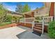 Covered porch featuring brick pillars and a charming white railing, perfect for relaxing outdoors at 681 Counsel Dr, Marietta, GA 30068