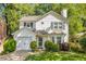 Charming two-story home with manicured lawn and inviting curb appeal in a desirable neighborhood at 1123 Seaboard Nw Ave, Atlanta, GA 30318