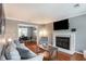 Cozy living room with hardwood floors, fireplace, and stylish furnishings, perfect for relaxing at 1123 Seaboard Nw Ave, Atlanta, GA 30318