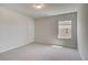 Bedroom featuring neutral walls, carpeted flooring, one window and closet at 616 Leafy Branch Way, Mcdonough, GA 30253
