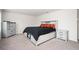 The bedroom showcases coordinating nightstands and dressers for a cohesive aesthetic at 7586 Jennadee Dr, Fairburn, GA 30213