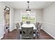 Inviting dining room with a modern table set and a view of the outdoors at 835 Ridge Ave, Stone Mountain, GA 30083