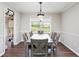 Cozy dining room with a window view and stylish furnishings at 835 Ridge Ave, Stone Mountain, GA 30083
