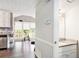 Bright kitchen with stainless steel appliances next to a partial view of a bathroom at 835 Ridge Ave, Stone Mountain, GA 30083