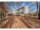A view of the home's backyard in the fall at 184 Chamberlyn Ln, Hiram, GA 30141