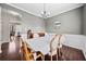 Charming dining room featuring hardwood floors, a chandelier, and access to other living spaces at 184 Chamberlyn Ln, Hiram, GA 30141