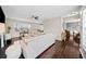 Spacious living room boasts hardwood floors, fireplace, neutral decor, and an open layout at 184 Chamberlyn Ln, Hiram, GA 30141
