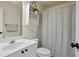 Cozy bathroom with a shower, vanity, and charming decorative accents at 2241 Harry Brooks Nw Dr, Atlanta, GA 30318